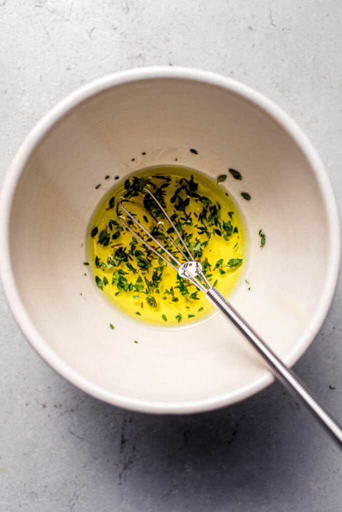 Sauce for braised fennel being whisked together. 