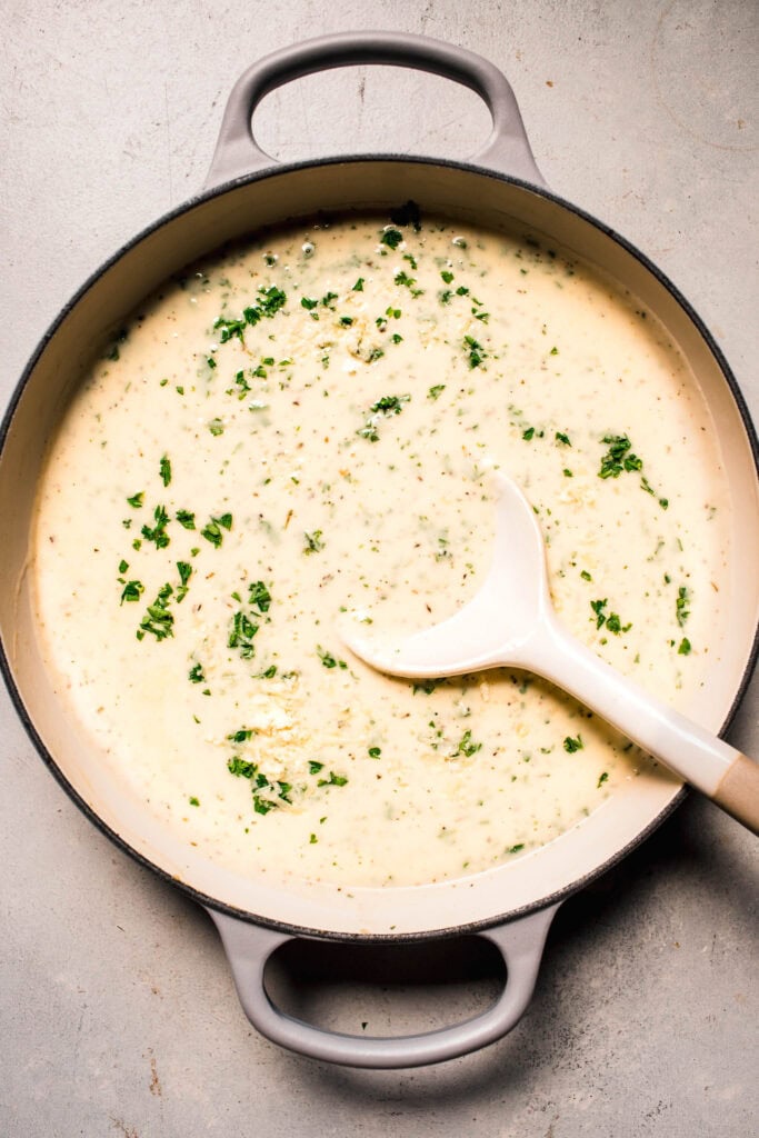 Finished parmesan cream sauce in skillet.
