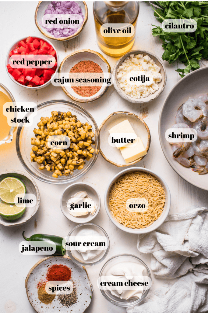 Ingredients for street corn orzo skillet labeled on counter. 