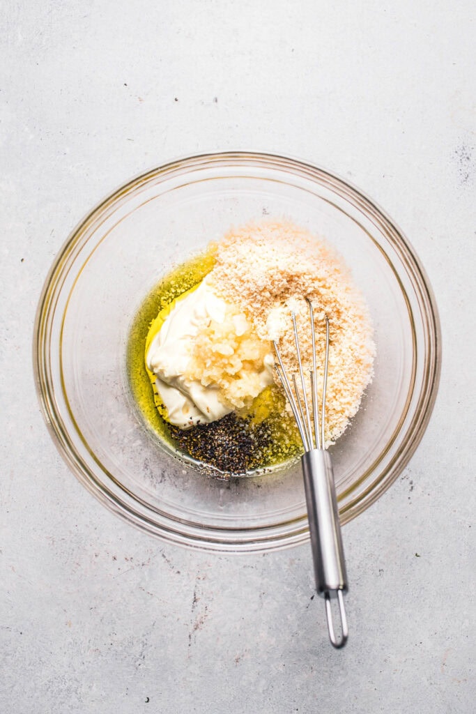 Caesar Dressing ingredients in small bowl. 