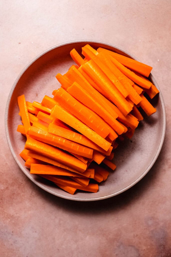 CARROTS CUT INTO MATCHSTICKS.