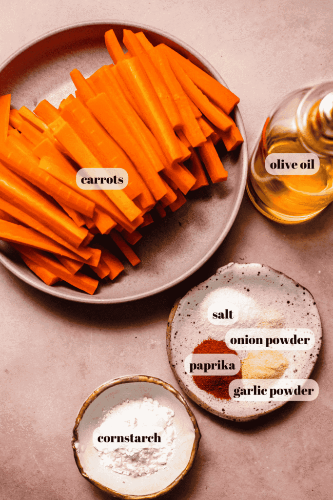 Ingredients for baked carrot fries labeled on counter.