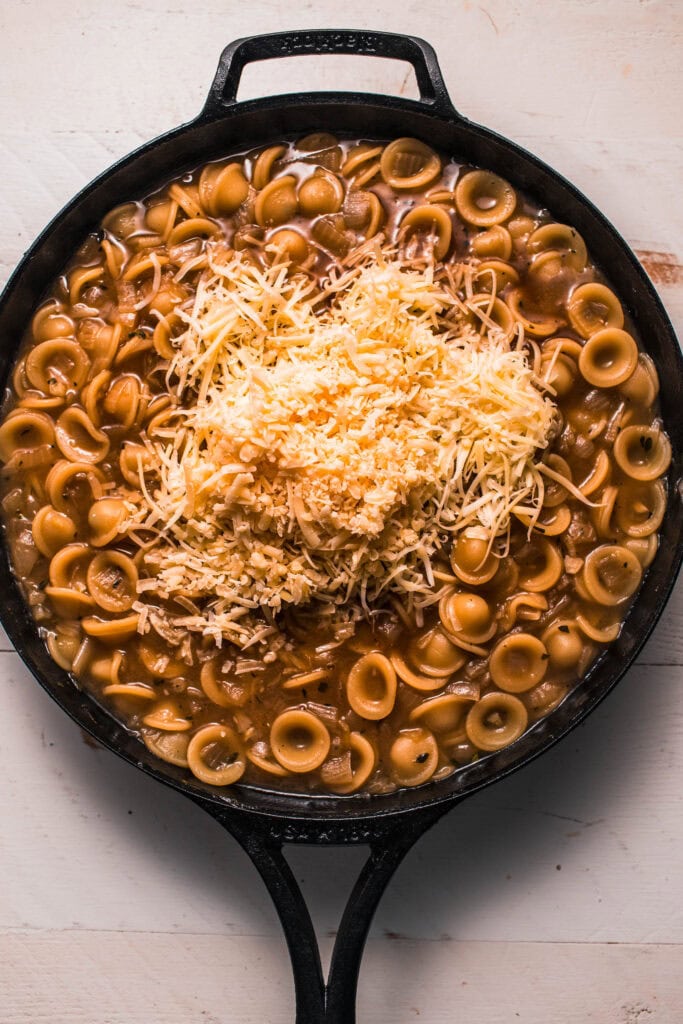 Cheese added to skillet.