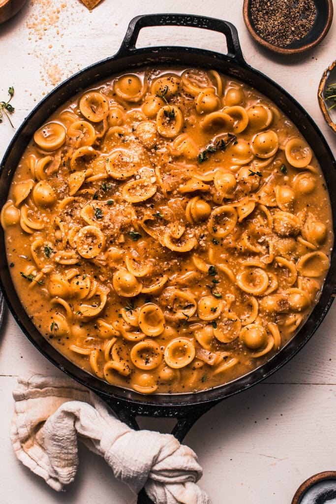 Finished french onion pasta in skillet.