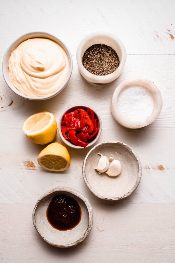 Ingredients for red pepper aioli on counter.