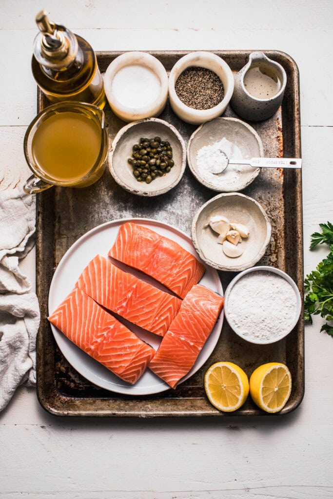 Ingredients for salmon piccata on counter.