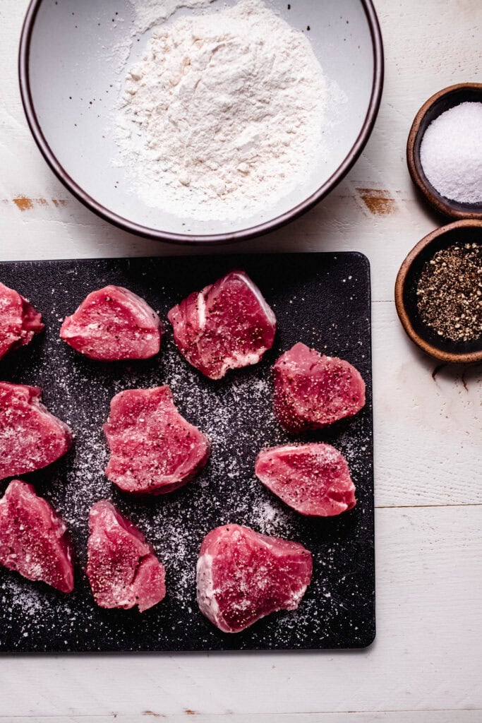 Pork tenderloin cut into medallions.
