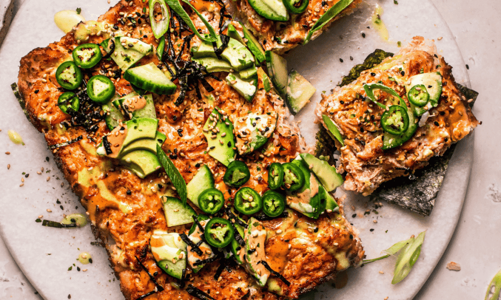 Horizontal image of sliced sushi bake ready to be served.