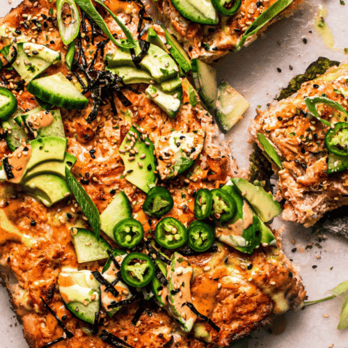 Horizontal image of sliced sushi bake ready to be served.