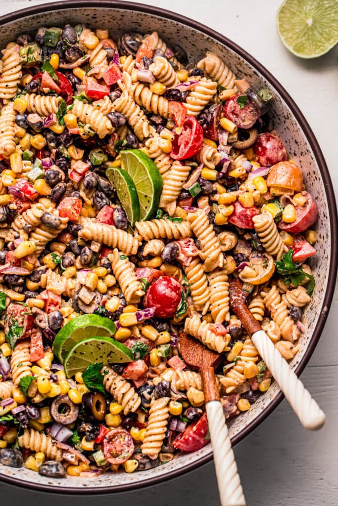 Close up of mexican pasta salad in serving bowl.