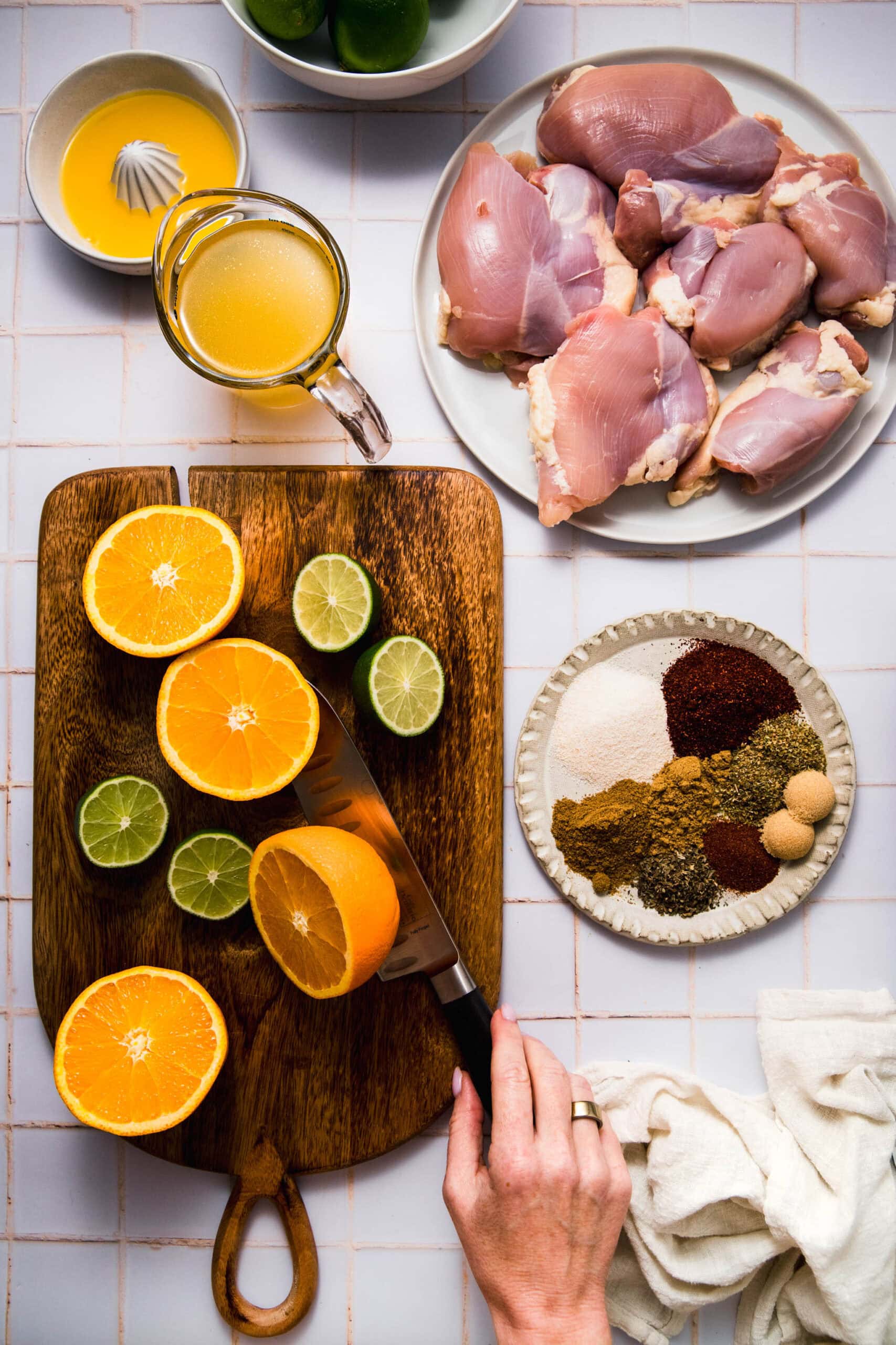 Ingredients for chicken carnitas on counter.