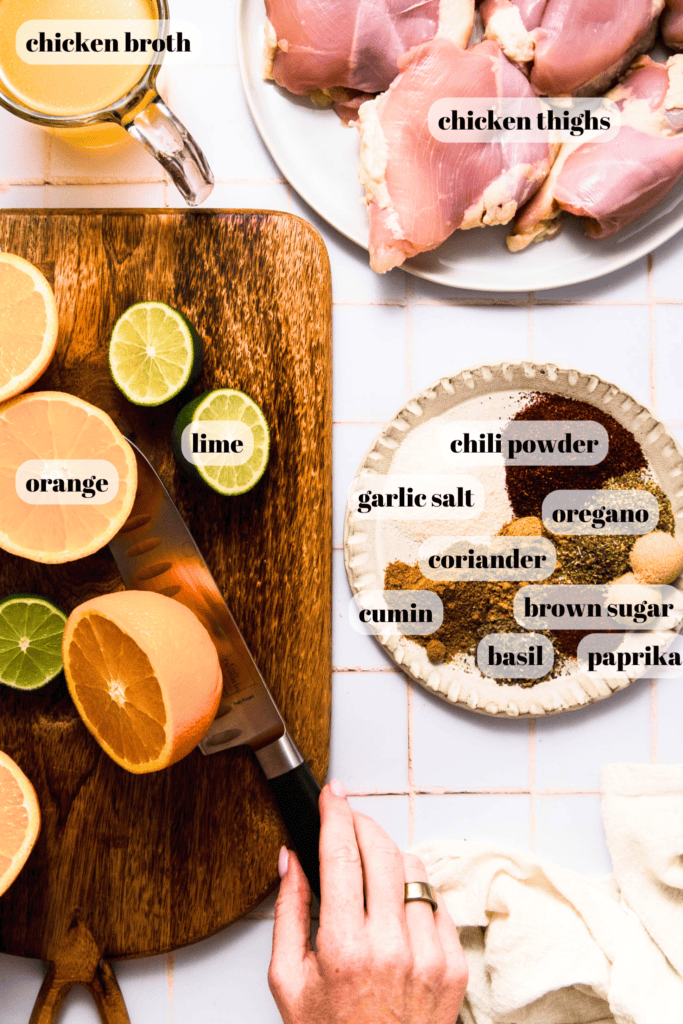 Ingredients for chicken carnitas labeled on counter.