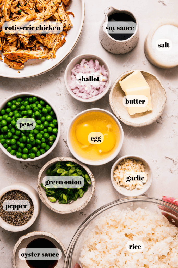Ingredients for rotisserie chicken fried rice labeled on counter.