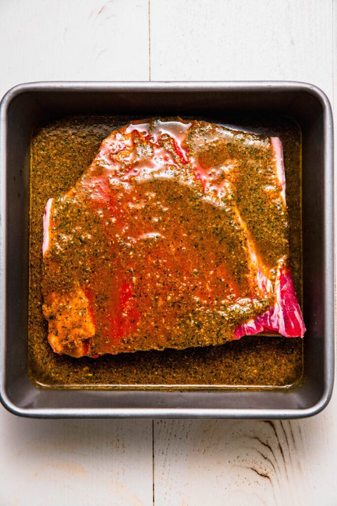 Flank steak in marinade.