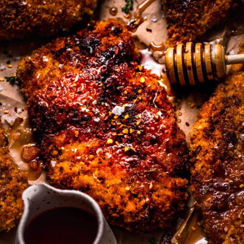 Extreme close up of piece of hot honey chicken.