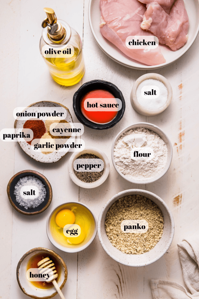 Ingredients for hot honey chicken labeled on counter.