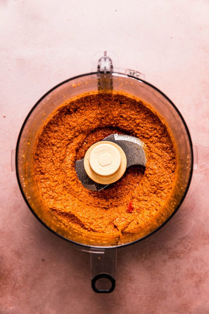 Finished muhammara dip in food processor bowl.