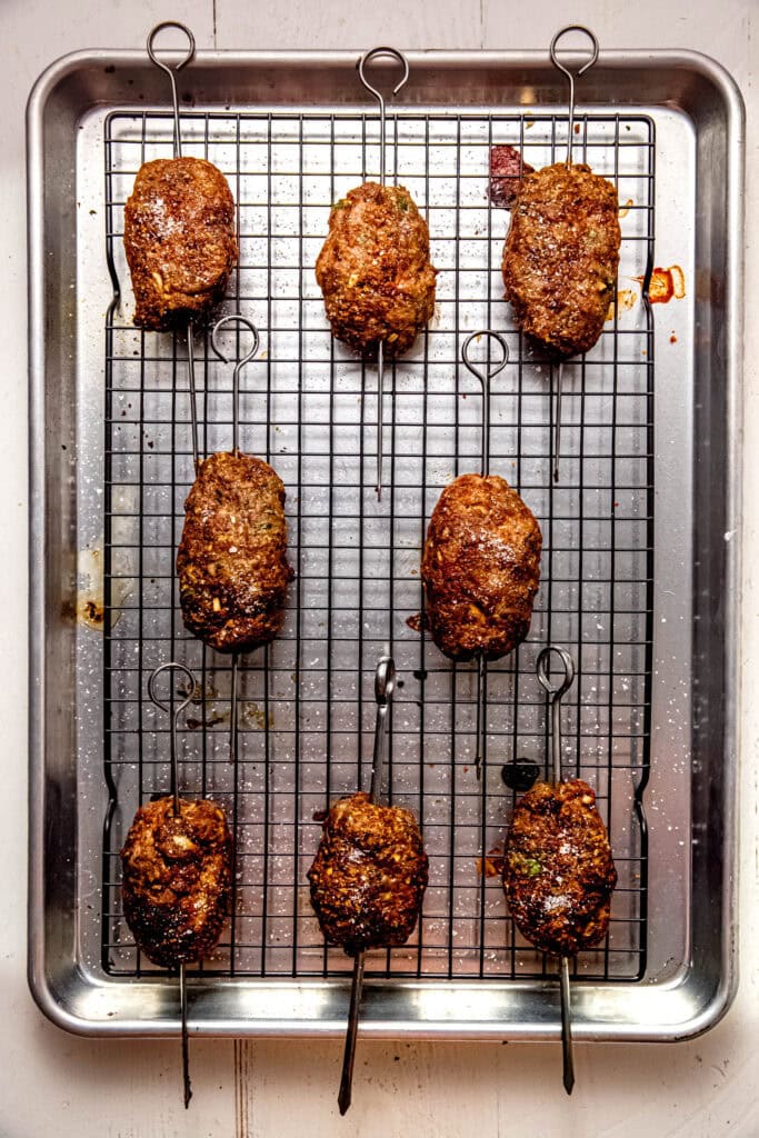 Baked kofta on baking sheet. 