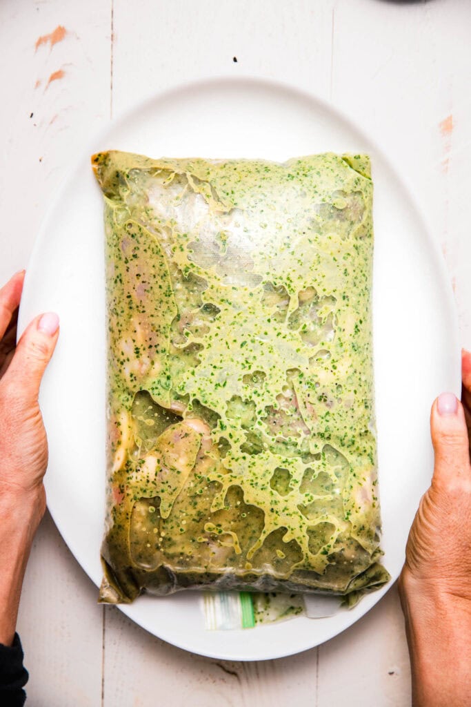 Chicken marinating in ziploc bag. 