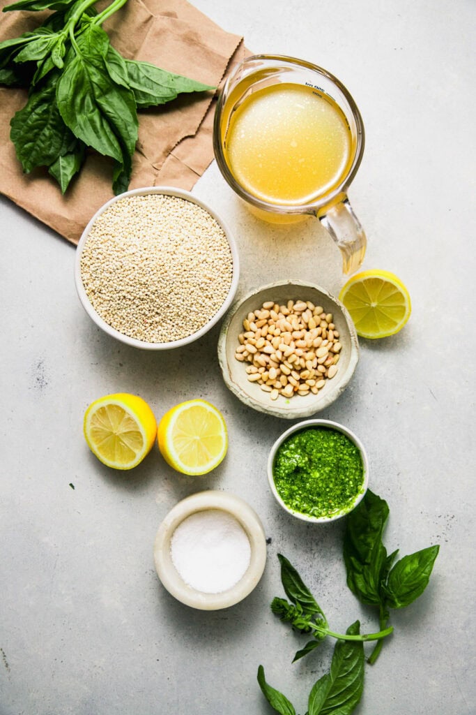 Ingredients for pesto quinoa on counter.
