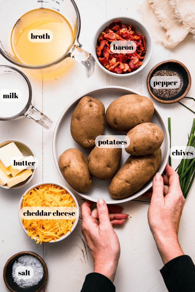 Ingredients for twice baked mashed potatoes labeled on counter.